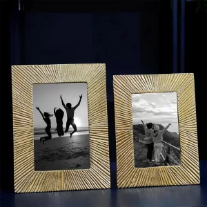 Antique golden metal rectangular photo frame set with sunburst design by COOL ART, available in 4x6 and 5x7 sizes for wall and table décor. Antique Golden Metal Photo Frame Set